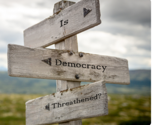 Democracy at a Crossroads: Signs of Decline and the Path to Resilience